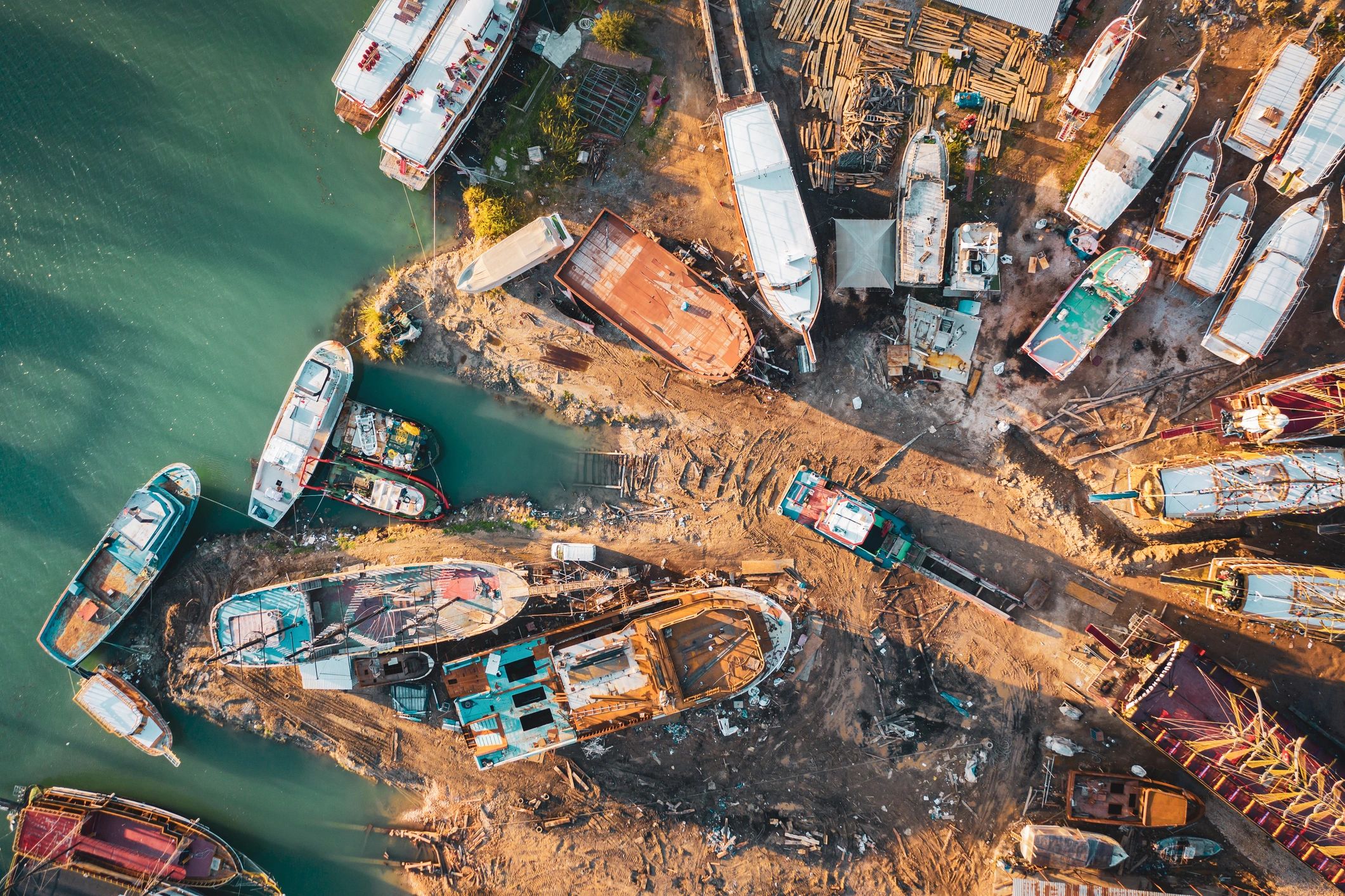 Boats stored in an outdoor marina-style yard
